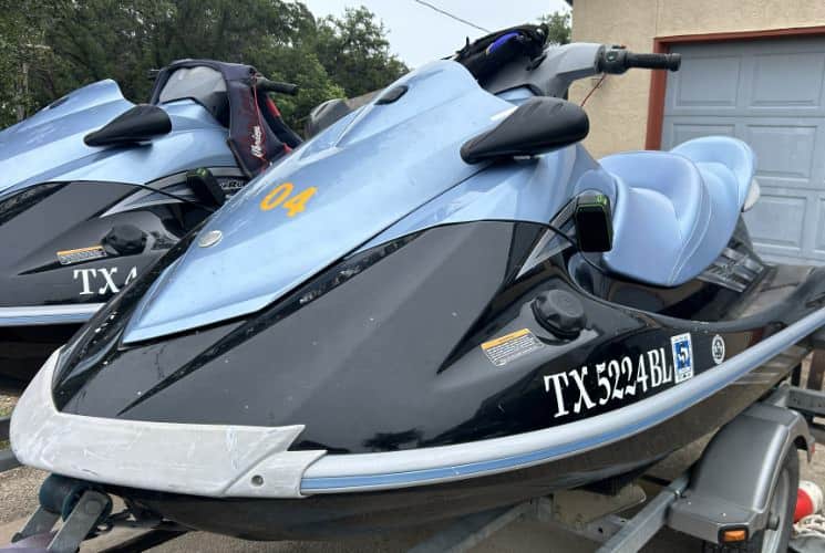 Black and light blue jet ski